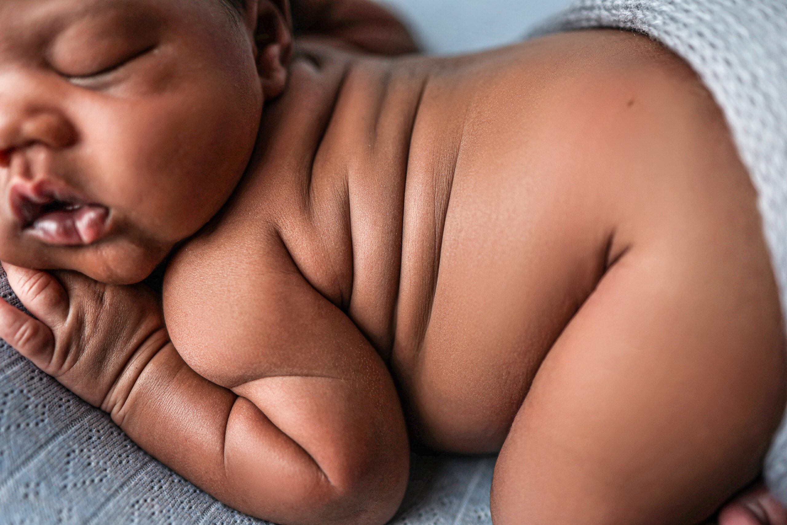newborn baby rolls newborn posing